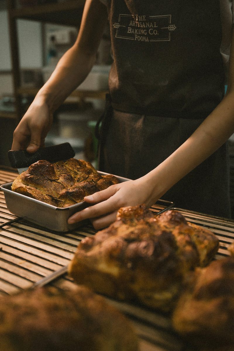Baker preparing fresh pastries